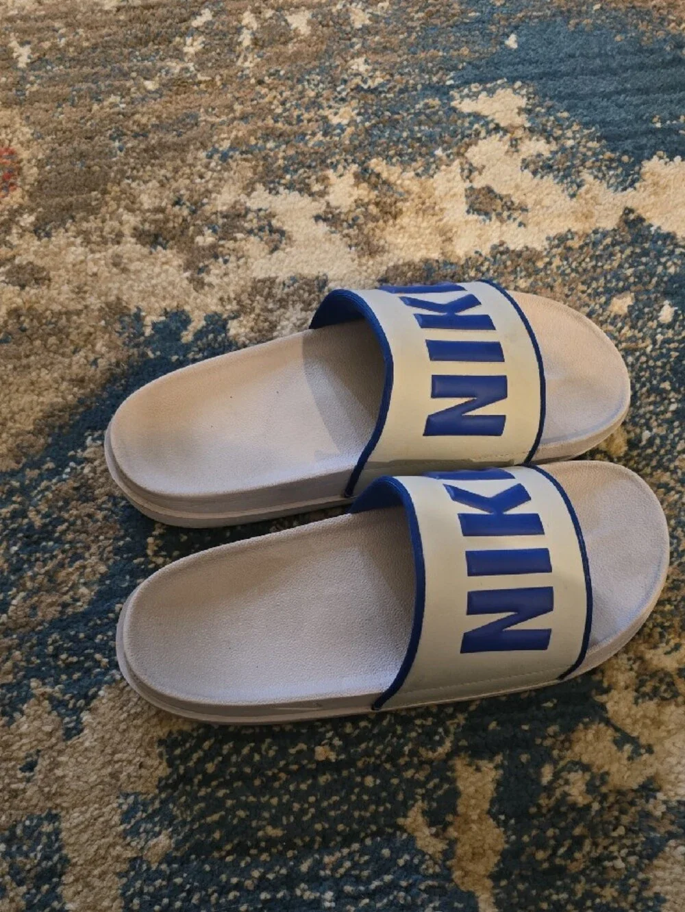Nike Grey and Blue Slide Sandals with Bold Logo